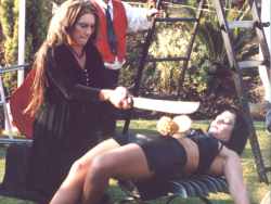 Bizarro (Anthea and Joan) perform the pineapple circus act