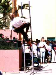 Donovan performs a balancing circus act